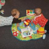 North Glendale Hts KinderCare Photo #1 - Tummy Time is so much fun when you are under one!