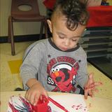Benedetti Drive KinderCare Photo #8 - Painting with trucks in Discovery Preschool