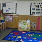 North Stygler KinderCare Photo #7 - PreK Classroom-The Group Time area where the child learn about the calendar, talk about the weather, practice counting, and listen to their teacher read books.