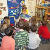 Glenview Knowledge Beginnings Photo #10 - Our PreKindergarten children are encouraged to assist the teacher during their circle time and story time
