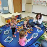 New Lenox KinderCare Photo #5 - Toddler Classroom calling out their own names at group time.