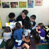 Emerald Wood KinderCare Photo #3 - Ms. Mia reading to her Discovery Preschool Class.