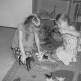 Mary Street KinderCare Photo #5 - Playing with animals in pre-k