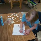 Prairie View KinderCare Photo #8 - Practicing those writing skills in the School-Age Classroom.