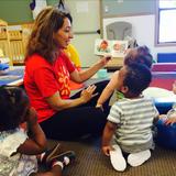 S Arlington Heights KinderCare Photo - Our Infant teachers help promote early language development by talking with our babies, singing songs, and reading books.