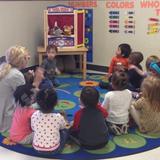 Oak Forest KinderCare Photo #3 - Ms. Elsa and Ms. Sarah love using their puppet stage to entertain their children!