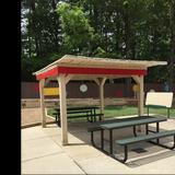 Leesville KinderCare Photo #7 - A picnic area to enjoy snacks on sunny days, to taste vegeables grown from our garden or to simply rest and take water breaks!