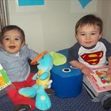 Naperville KinderCare Photo - Story time is one of the many language building activites in the infant classroom.