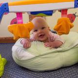 Meadowlands KinderCare Photo #5 - One of the infants shows her award winning smile during tummy time.