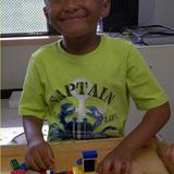 Palos Hills KinderCare Photo #9 - Prekindergarten Classroom - Jayden Enjoying LEGO Bricks