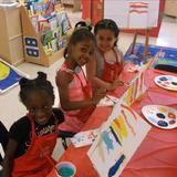 Constitution KinderCare Photo - Our students enjoy Painting and Popcorn during our summer camp.