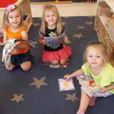 80th Avenue KinderCare Photo #6 - Preschool Class Reading