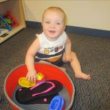 Hudson KinderCare Photo #4 - Infant playing in the discovery basket