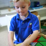 Village Montessori School Photo - Constructive Triangles are a preparation for Geometry at the preschool level.