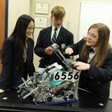 St. Patrick Catholic High School Photo #5 - Engineering students work on their latest robot.