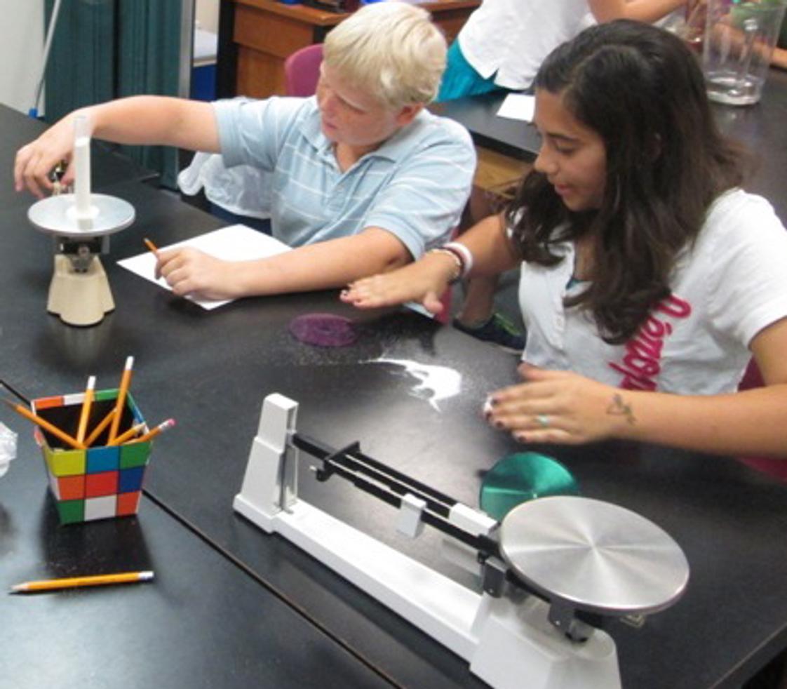 The Willow School Photo #1 - Middle schoolers conducting science experiments.