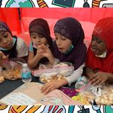 Charlotte Islamic Academy Photo #3 - our Charlotte Islamic School elementary students enjoying popcorn with a good book