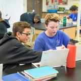 St. Joseph Catholic School Photo #5 - Students work with their Chromebooks in the science lab.