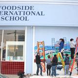 Woodside International School Photo #4 - Our mural class painting the school with San Francisco neighborhood scenes.