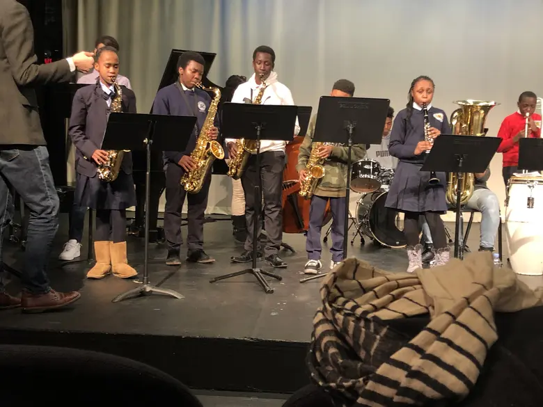 Mt. Pleasant Christian Academy International Photo #2 - Upper school students take instrument class at Harlem School of the Arts. Students take a variety of instruments for the year such as clarinet, saxophone, trumpet, and trombone.