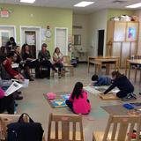 Mountain West Montessori Photo - Children show their work to parents during a Parent Meeting.