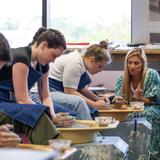 Second Baptist School Photo #7 - Upper school art students learn how to throw pottery in 3D art!