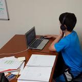 American Boys Preparatory Academy Photo #1 - American Boys Prep student learning at his own pace.
