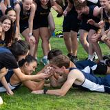 Pope John Paul II High School Photo - JPII's highly successful girls and boys cross country teams always find time for fun in between their wins! The girls team is the four-time reigning 1B/2B State Champ and the boys have placed 2nd for five consecutive years!