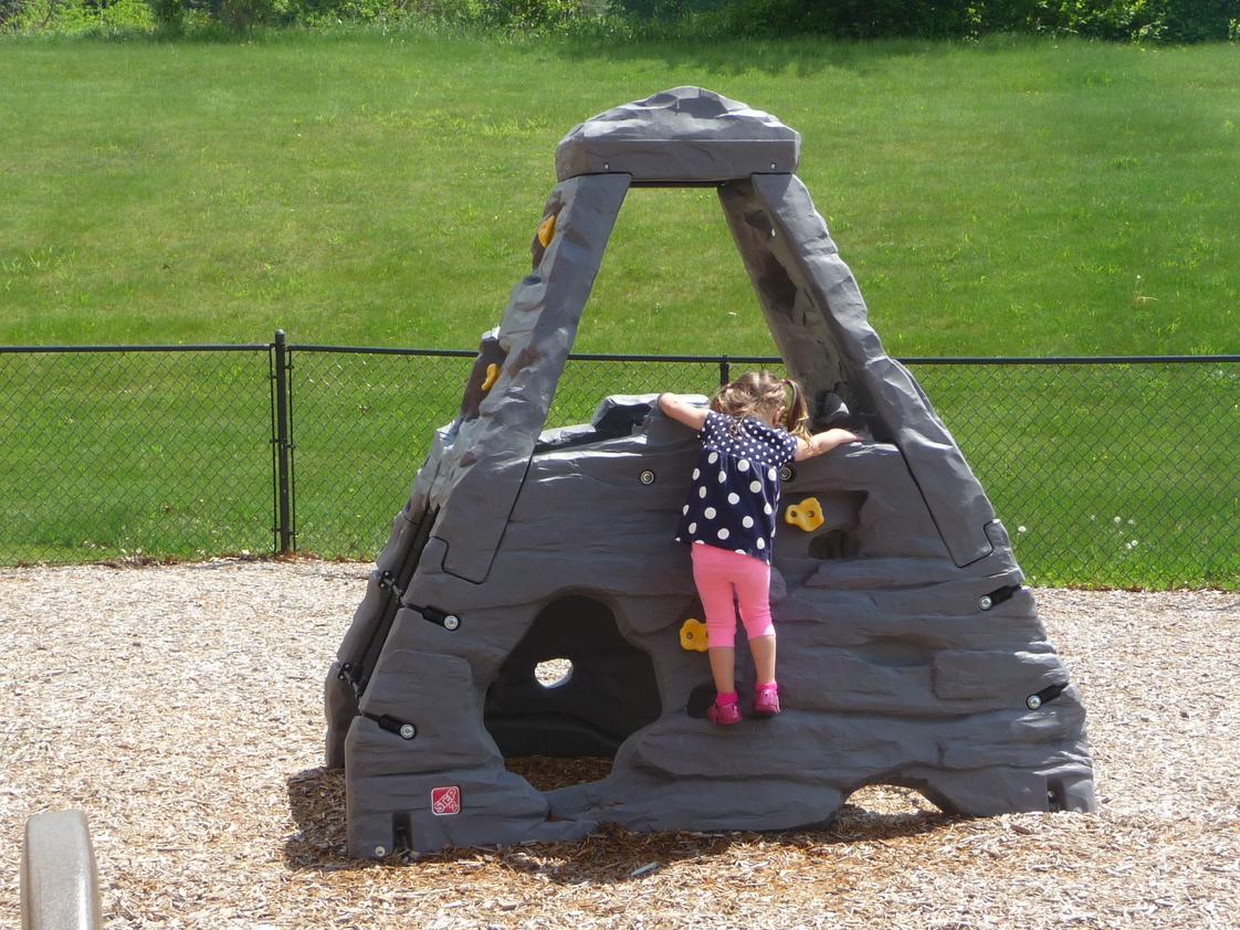 Grace Academy Photo - Children love to climb up the "Mountain Climber" in our playground!