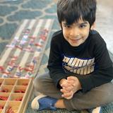 Indiana Montessori Academy Photo #8 - An IMA students builds words with the Movable Alphabet.