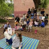 New Amsterdam School Photo #4 - Story time in the Garden