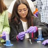 Our Lady Of Mercy Preparatory Academy Photo - OLM Prep Middle School student investigating through experiments in science.