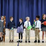 St. Thomas Aquinas Catholic School Photo #3 - St. Thomas operates a highly successful Athletics Program featuring ten interscholastic teams and clubs. For a small school, our Athletics Program packs a big punch, from basketball and golf to tennis and skiing. Our Athletics Program plays a key role in boosting school spirit by bringing students together through exciting games, team pride and pep rallies that celebrate community.