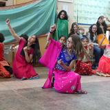 Whitby School Photo #4 - As part of International Day during Spirit Week, students from South Asia formed a Bhangra Train and performed a folk dance in the lobby.
