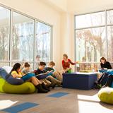 The Pilot School Photo #6 - The classroom does not always mean a desk and chairs. With a variety of teaching spaces, inside and out, our teachers move their class to take advantage of sun light, alternate seating options, and physically stimulating learning settings.