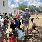 Crane Brook Academics Photo #5 - More Field Day fun! Max switched sides to help our younger students take on the high schoolers during the water balloon battle. At Crane Brook, students of all ages come together to learn, laugh, and make memories.
