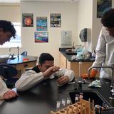 Sophia Academy Photo #7 - Measuring using a graduated cylinder in science class