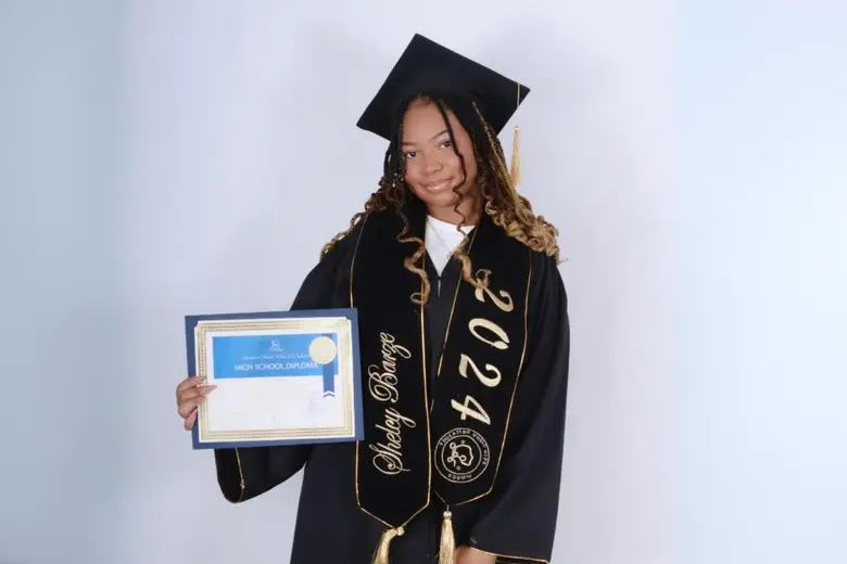 Education World Wide Photo #2 - Our graduate with a High School diploma