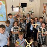 Adolesco Preparatory Academy Photo #14 - History is a highly valued subject at APA and we make it fun while exposing students to God's story through cyclical eras of history. In this photo, students are learning the Medieval Era and made functional boomerangs after learning about the Australian Aborigines.