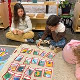 Pinyon Montessori Photo #2 - Montessori cultural materials introduce children to geography, history, science, music, and art through hands-on experiences. These materials, like globes, maps, puzzles, and classified cards, engage children in exploring the world around them, fostering a love for learning and a global perspective.