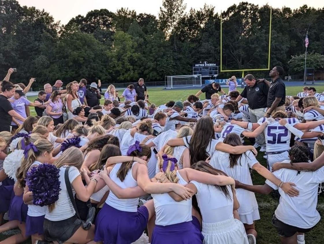 Ambassador Christian School Photo #1 - Prayer at the first football game