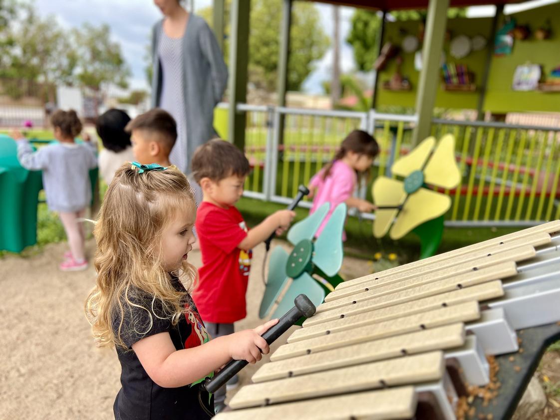 Village Preschool Academy Photo #1 - Making music, memories, and fun in our Outdoor Music Garden!