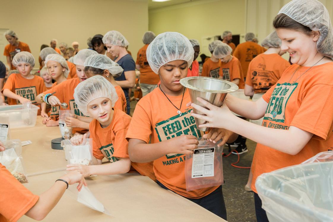 Bethany Christian School Photo #9 - Our students regularly support the Village of Hope Orphanage in Haiti by packing meals, donating school supplies, and going on Spring Break Mission Trips to Haiti. We teach our students to be servant-minded and to think of others before themselves. Showing them it is not "if they can impact the world", but "how they can impact it".