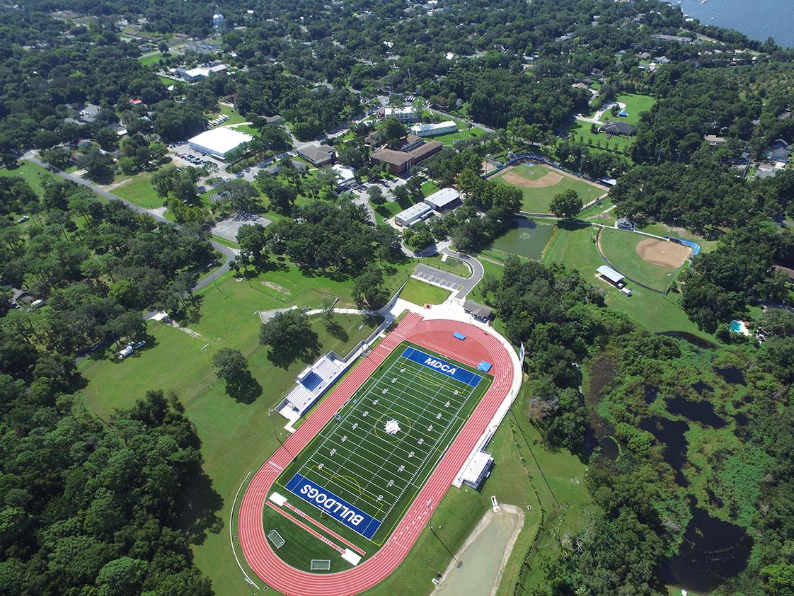 Mount Dora Christian Academy Photo #1 - Our beautiful 70 acre campus featuring our athletic complex with stadium seating, artificial turf and olympic standard track.