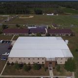 Gateway Academy Photo #5 - This is an aerial view of the Family Ministry Center (front), left to right, is the Education building, Dining Hall, and the Barracks. Very back is the soccer field, volleyball, basketball and baseball field.