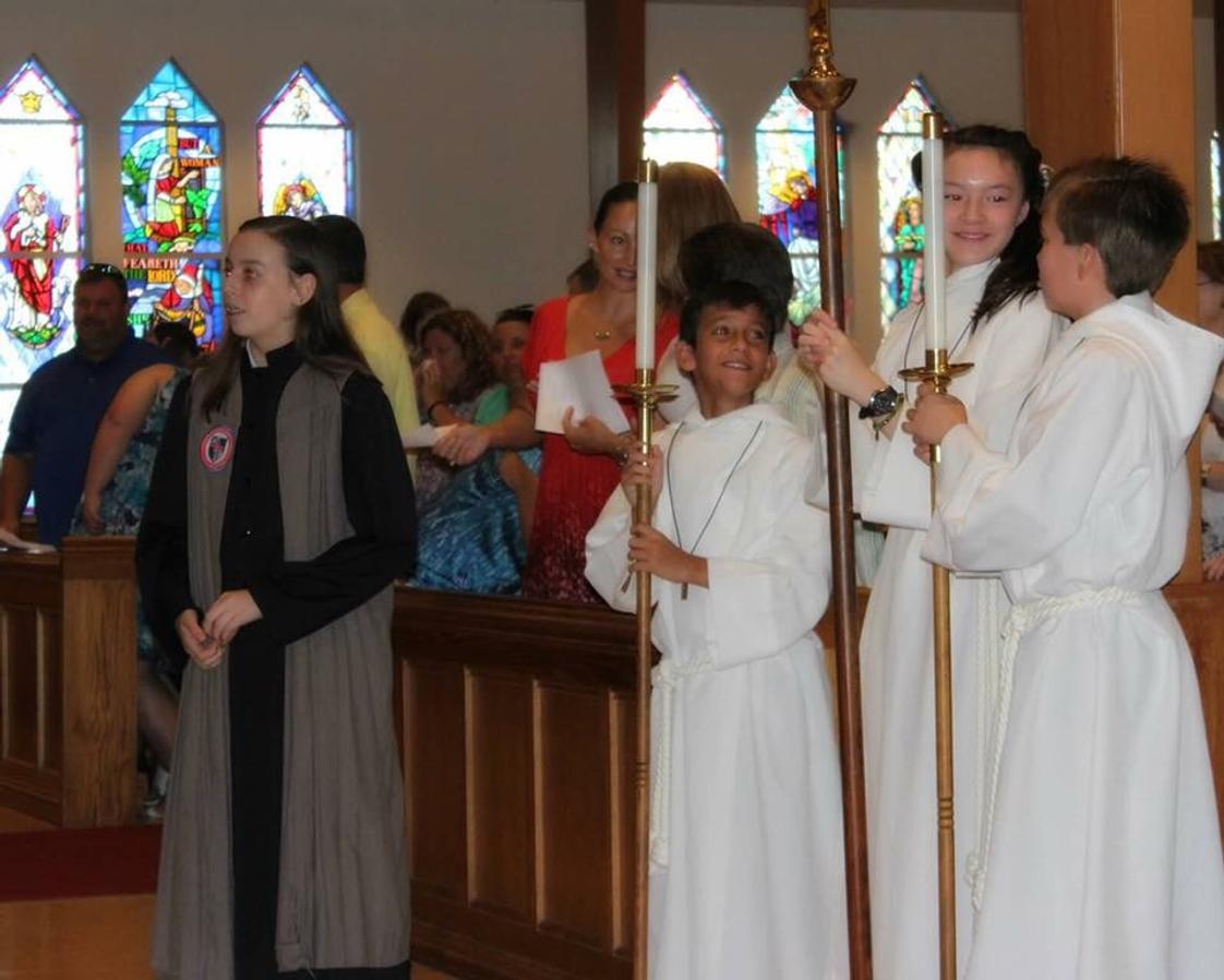 Grace Episcopal Day School Photo - Middle School Acolytes in weekly Chapel Service.