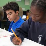 Lake Rose Christian Academy Photo #7 - Lake Rose Christian Academy students engage in focused, independent work, studying and completing assignments in a structured classroom environment.