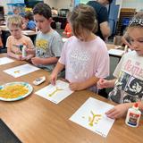 Millhopper Montessori School Photo #8 - Making pasta skeletons in Summer Camp