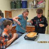 Sandpoint Christian School Photo #5 - Flipping giant pancakes on Pancake Day, which we celebrate at the end of each quarter. Pancakes and juice for all!