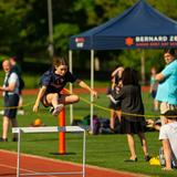 Bernard Zell Anshe Emet Day School Photo #3 - Jumping hurdles at a CAMS League Track Meet
